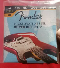 SET OF 4 FENDER GUITAR STRINGS SUPER BULLETS 3250R NICKELPLATED STEEL. 010-046