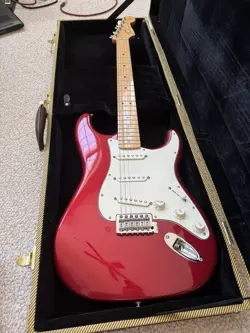 BEAUTIFUL RED AUTHENTIC FENDER STRATOCASTER WITH HARD CASE.