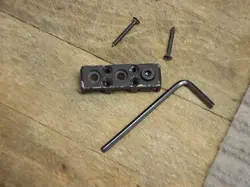 VINTAGE 1980S FENDER SYSTEM 1 LOCKING GUITAR NUT BASE METAL NUT BLACK