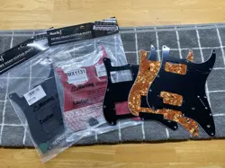 5 FENDER STRATOCASTER PICKGUARDS - STANDARD 11 SCREW HOLE - 4 NEW, 1 USED - OBO