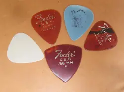LOT OF FIVE ASSORTED PICKS VARIOUS SHAPES & GUAGES FENDER, TORTEX, NICE BUNCH