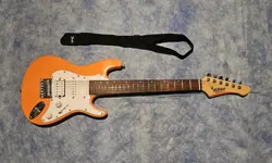 MITCHELL TD100 SHORT-SCALE ELECTRIC GUITAR ORANGE WITH FENDER STRAP