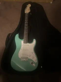 SEA FOAM GREEN STRAT , FENDER RUMBLE 15 AMP , FENDER GUITAR CASE
