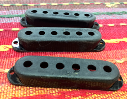 THREE BLACK VINTAGE RELIC FENDER STRATOCASTER GUITAR PICKUP COVERS, STRAT