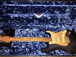 INDIVIDUALS WITH A THUNDEROUS TIGER'S EYE NECK FENDER CUSTOM SHOP AMERICAN STRAT