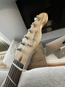 BLACK FENDER SQUIRE TELECASTER! NEVER USED, GREAT CONDITION. CUSTOM PICK GUARD!!