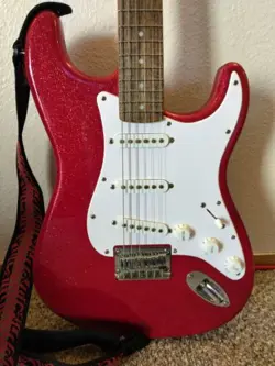 SQUIRE STRATOCASTER BY FENDER LIMITED EDITION RED SPARKLE