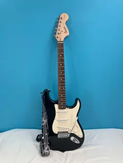 SQUIER STRAT BY FENDER BLACK WHITE ELECTRIC GUITAR W/ STRAP & CASE - TESTED