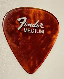 VINTAGE GUITAR PICK-FENDER 1960’S PRE-CBS-351 MEDIUM CELLULOID-SMALL LOGO- RARE