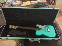 WARMOTH TELECASTER CUSTOM WITH DIMARZIO (NECK) AND FENDER/GRETCH (BRIDGE) TRONS