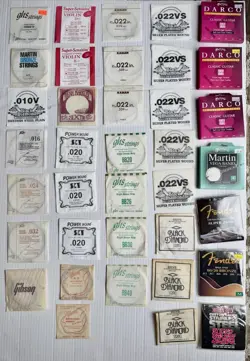 MIXED LOT OF (MOSTLY) GUITAR STRINGS ERNIE BALL FENDER GIBSON BLACK DIAMOND GHS
