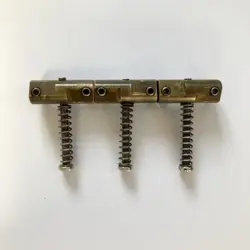 COMPENSATED BRASS SADDLE