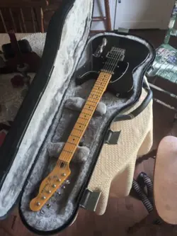 BLACK FENDER MODERN PLAYER PLUS TELECASTER WITH HARD CASE