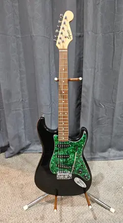 WITH GREEN PICKGUARD