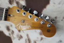 FENDER STRATOCASTER SQUIER GUITAR RED ALDER W/AMBER FINISH NECK.