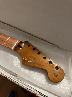 GENUINE FENDER ROASTED MAPLE STRATOCASTER GUITAR NECK, WITH PAU FERRO FRETBOARD