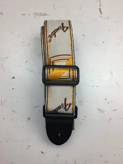 [USED] FENDER MONOGRAMMED GUITAR STRAP (WHITE/YELLOW/RED) - LONG