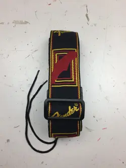[USED] FENDER MONOGRAMMED GUITAR STRAP (BLACK/YELLOW/RED)