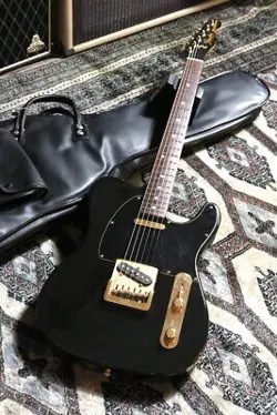 FENDER COLLECTORS EDITION BLACK AND GOLD TELECASTER  CE12057
