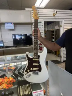 FENDER AMERICAN ULTRA STRATOCASTER LEFT HANDED ELECTRIC GUITAR, WHITE 2023