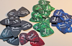 LOT OF 49 FENDER GUITAR PICKS MEDIUM CELLULOID BLUE GREEN RED BLACK
