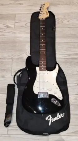 FENDER SQUIER STRAT ELECTRIC GUITAR WITH CASE AND GUITAR STRAP 