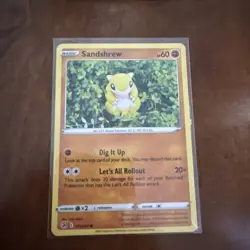 Sandshrew 131/264 SWSH08: Fusion Strike Pokemon TCG Card Yuka Morii Clay Art - Image 1