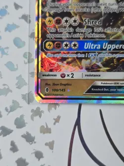 Kommo-o GX 100/145 Pokemon Card Sun & Moon Guardians Rising Holo Rare TCG Art - Image 2