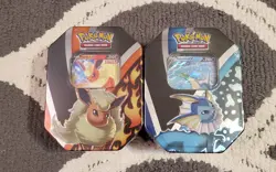 Pokemon TCG Evolutions Tin 2021 Vaporeon + Flareon V Evolving Skies Sealed - Image 1