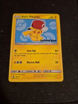 Ash’s Pikachu SM113 Ultra Rare Non Holo Exclusive Promo Pokemon Card - Image 1