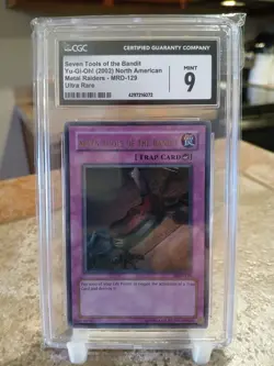 Yugioh TCG Seven Tools of the Bandit CGC 9 MRD-129 (Some Case Scratching) - Image 1