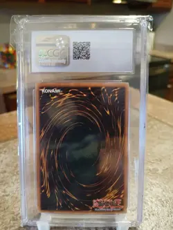 Yugioh TCG Seven Tools of the Bandit CGC 9 MRD-129 (Some Case Scratching) - Image 2