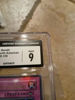 Yugioh TCG Seven Tools of the Bandit CGC 9 MRD-129 (Some Case Scratching) - Image 4