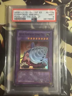 Yugioh: Super Vehicroid Jumbo Drill - POTD-EN036 - Super Rare 1st Edition PSA 9 - Image 1