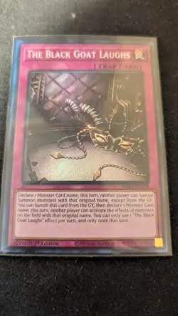 YUGIOH THE BLACK GOAT LAUGHS SECRET RARE PHNI-EN078 1ST ED NEAR MINT - Image 1