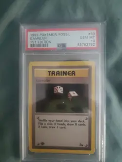 1999 Pokemon Fossil Gambler 1st Edition PSA 10 - Image 1
