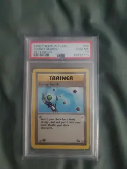 1999 Pokemon Fossil Energy Search 1st Edition PSA 10 - Image 1