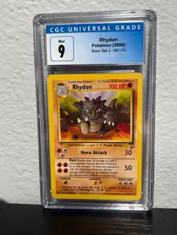 Rhydon Pokemon Base Set 2 2000 #59 CGC 9 - Image 1