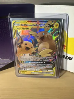 Raichu Alolan Raichu GX Tag Team Holo Card 54/236 Sm-Unified Minds - Image 1