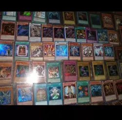 250 YUGIOH ASSORTED CARDS LOT WITH MULTIPLE HOLOS & RARES, etc. - Image 1