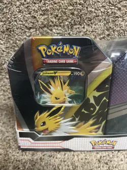 Pokémon Trading Card Game: Jolteon Espeon Tin Bundle Sealed - Image 6