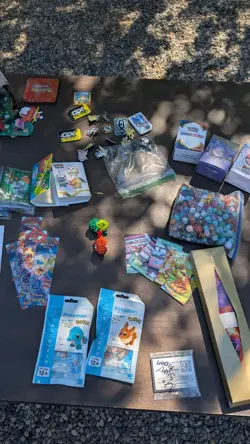 Pokemon Lot Of Toys Figurines Coins  Posters Binders Pins Dice Playmat And More - Image 11