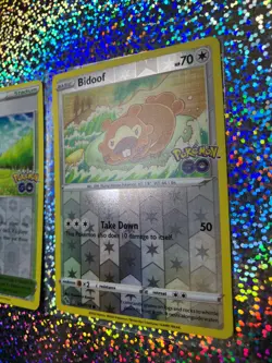 Pokemon TCG GO Common Reverse Holo 059/078 Bidoof (Peelable Ditto) - Image 4