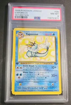 1999 Pokemon Jungle 1st Edition Vaporeon Card 28/64 PSA 8 - Image 1