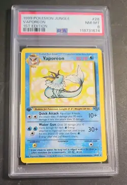 1999 Pokemon Jungle 1st Edition Vaporeon Card 28/64 PSA 8 - Image 1