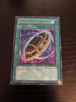 Yugioh Burial from a Different Dimension DP03-EN026 Ultra Rare 1st Edition HP - Image 1