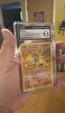 CGC 9.5 Mint+ Charizard 003/034 Pokemon Trading Card Game Classic TCG  - Image 1