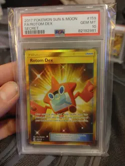 2017 Pokemon Sun & Moon Rotom Dex Full Art Gold Secret Rare 159/149 PSA 10 - Image 3