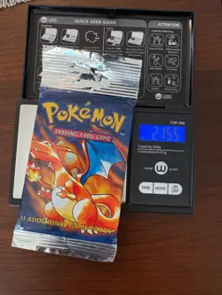 1999 WotC Pokemon Base Set Booster Pack Charizard Art, 21.55g - Image 1