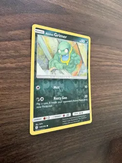 Pokemon Card - Alolan Grimer Cosmic Eclipse 130/236 Reverse Holo Common NM - Image 3
